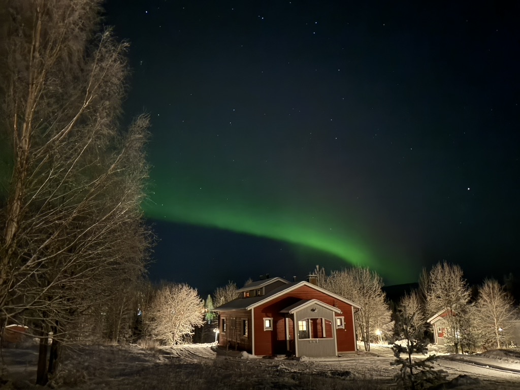 Äkäslompolo, Finland — Northern Lights over Lapland cabin